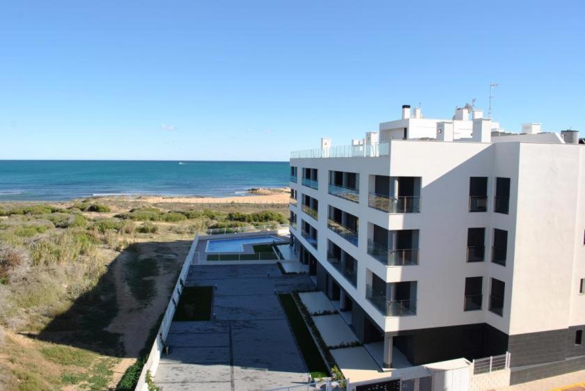 Pinada Beach IV New & Comfort. Apartment, 1St Line To The Beach, Sunterrace+Pool La Mata  Exterior photo